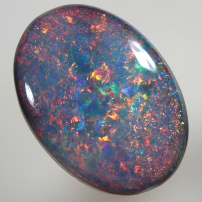 SOLID BLACK OPAL Bright Floral Harlequin pattern, red / blue combination - rare! SEE VIDEO